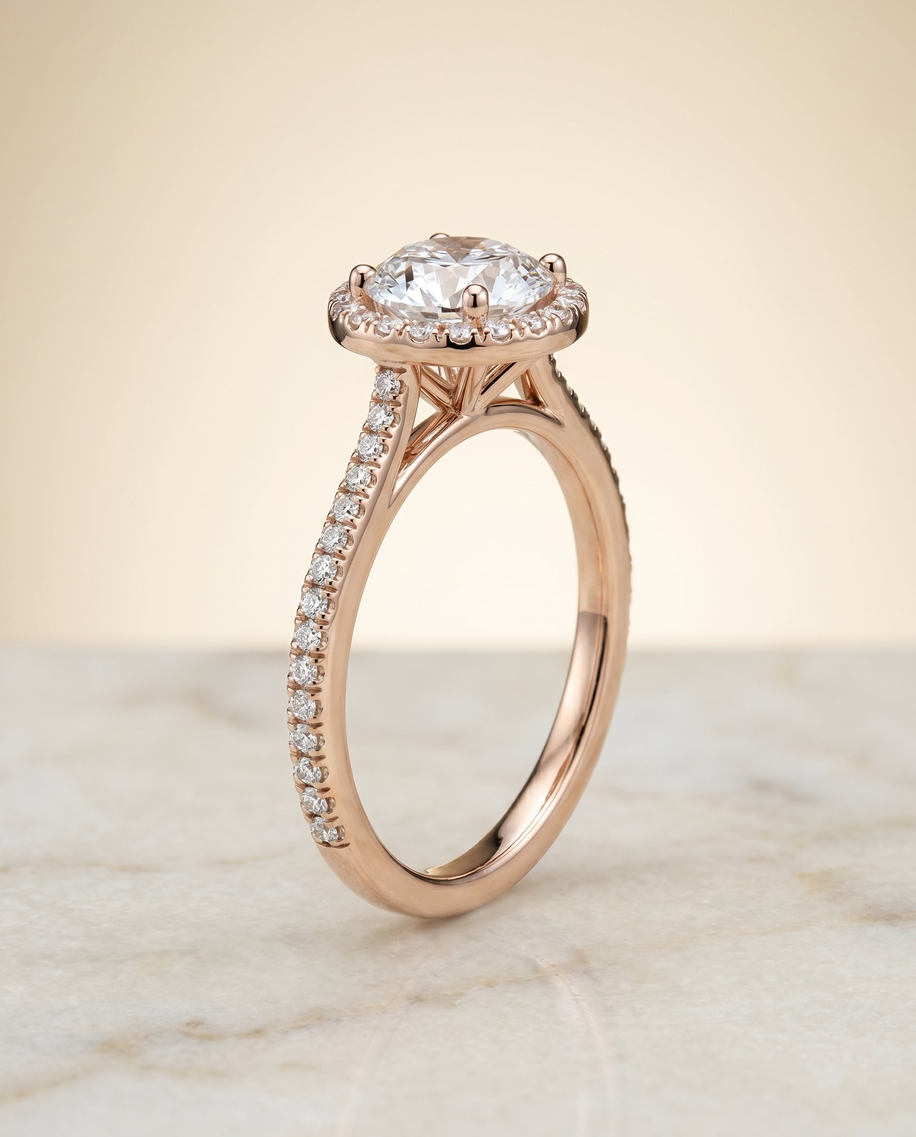 Sonata Select Graduated Shank Pavé Halo Round Lab Diamond Engagement Ring in 14K Rose Gold, front view | RockHer