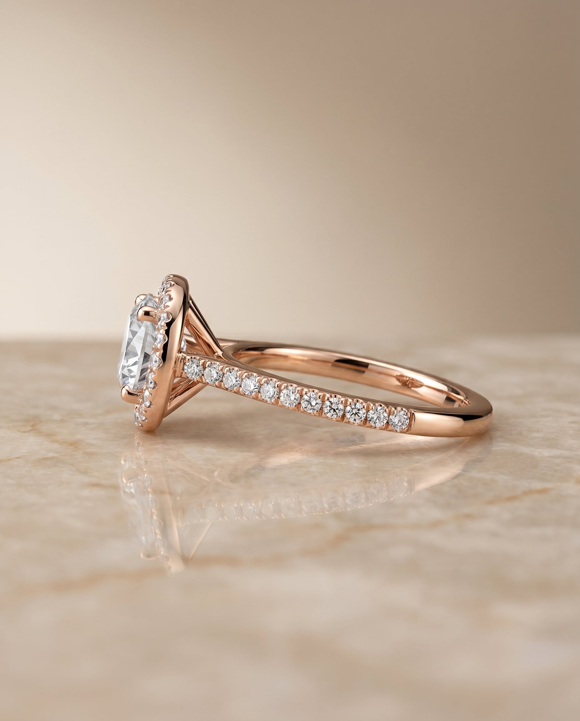 Sonata Select Graduated Shank Pavé Halo Round Lab Diamond Engagement Ring in 14K Rose Gold, side view | RockHer