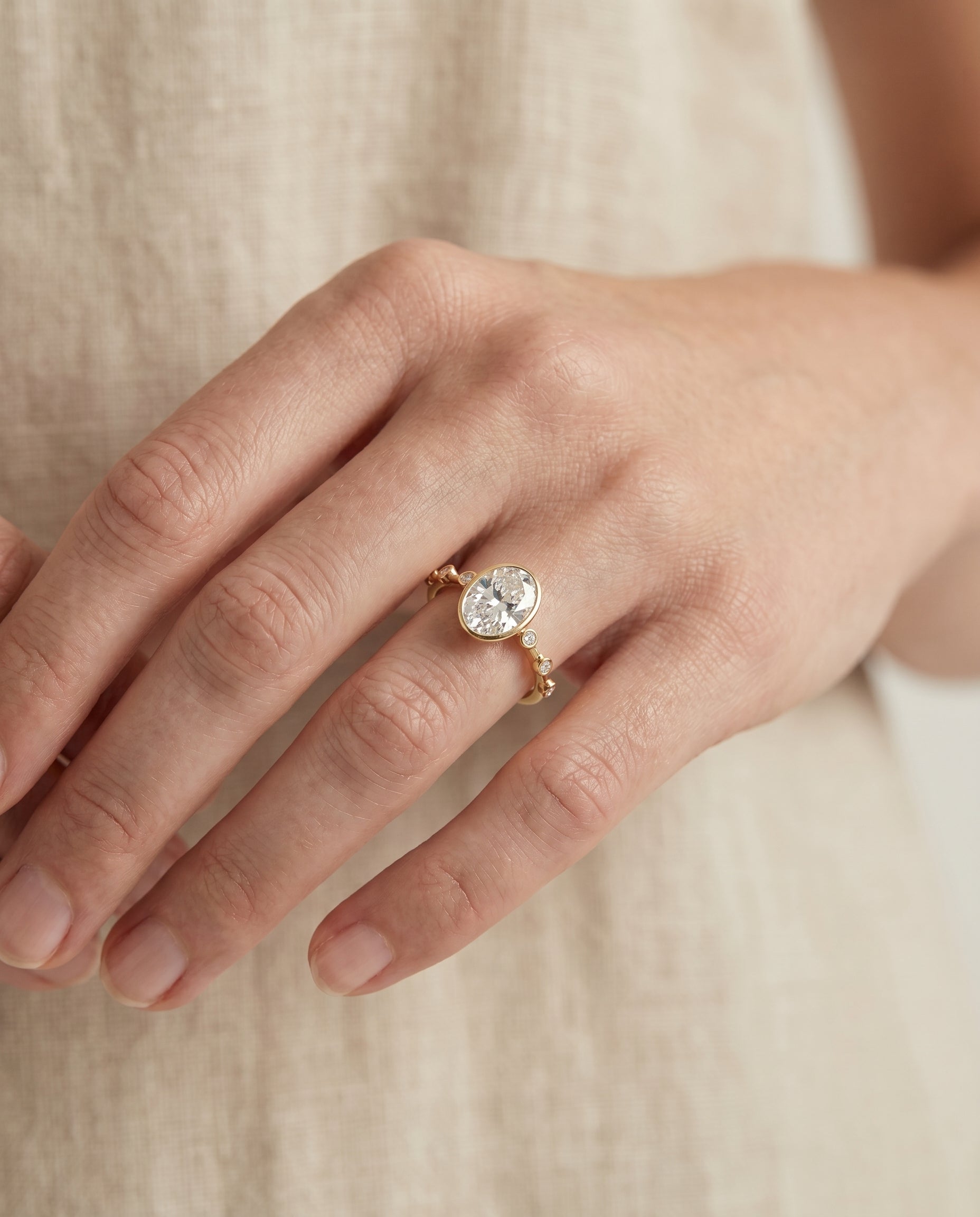 The Brandi engagement ring setting in 18K Yellow Gold, select bezel accent solitaire design | RockHer