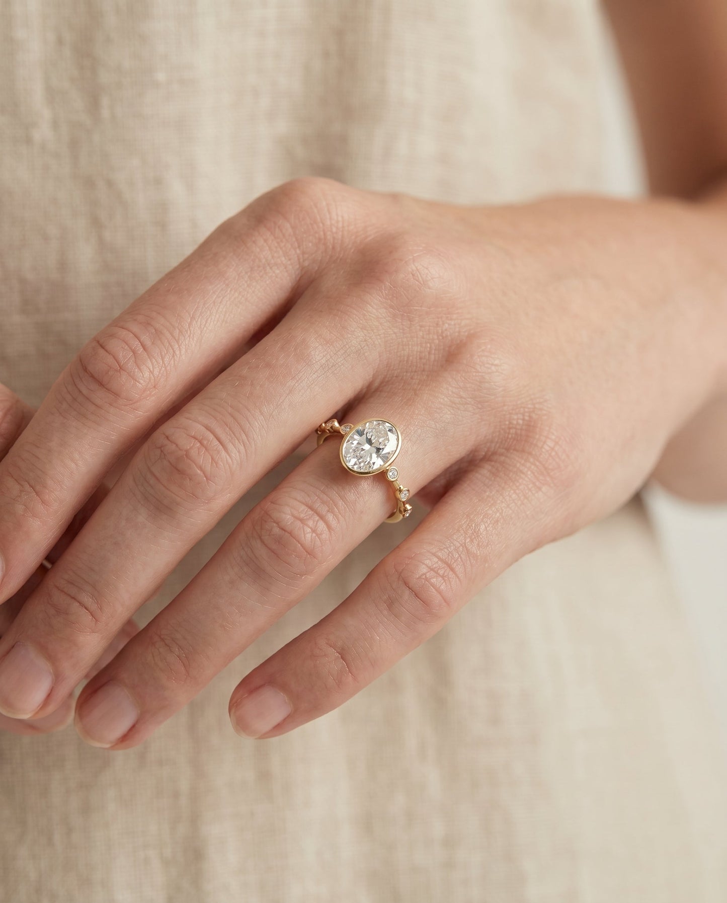 Brandi Select Bezel Accent Solitaire Oval in 14K Yellow Gold – view 3