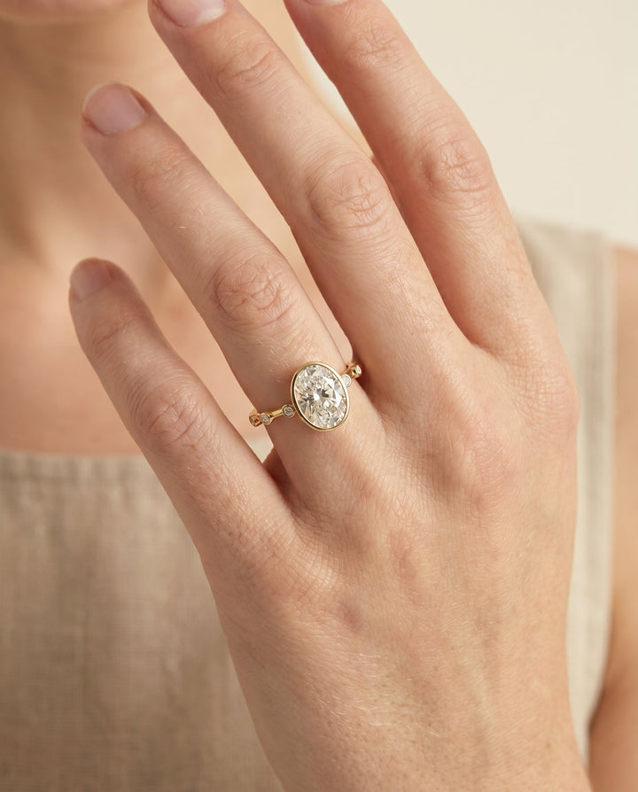 Brandi Select Bezel Accent Solitaire Oval in 14K Yellow Gold – view 5
