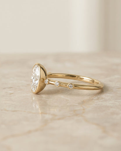 Select Bezel Accent Solitaire styling on The Brandi oval engagement ring setting | RockHer