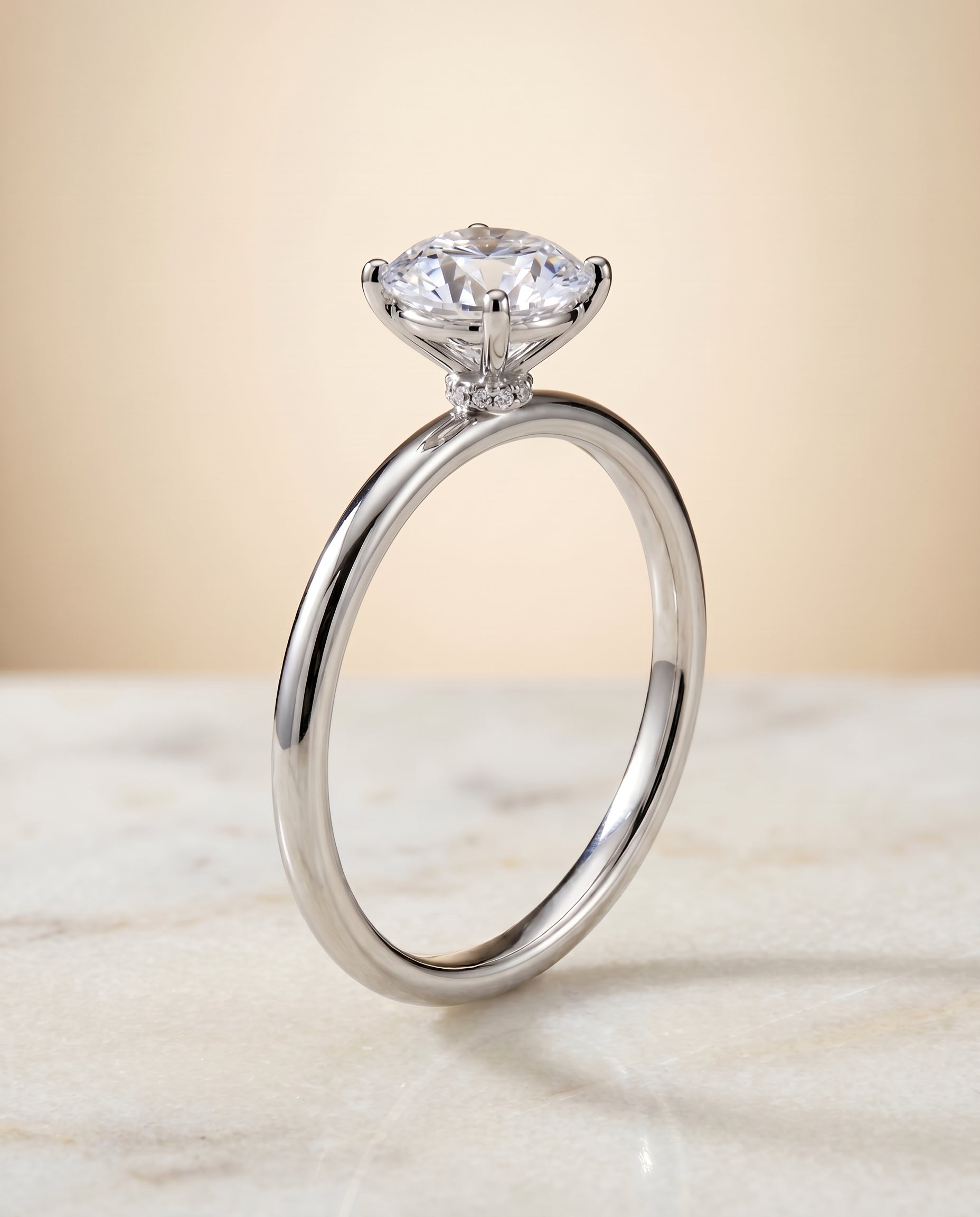 Hidden Halo Solitaire styling on The Joni round engagement ring setting | RockHer