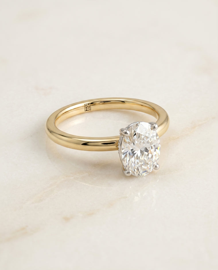 The Joni Hidden Halo Solitaire Oval Engagement Ring Setting in 18K Yellow Gold