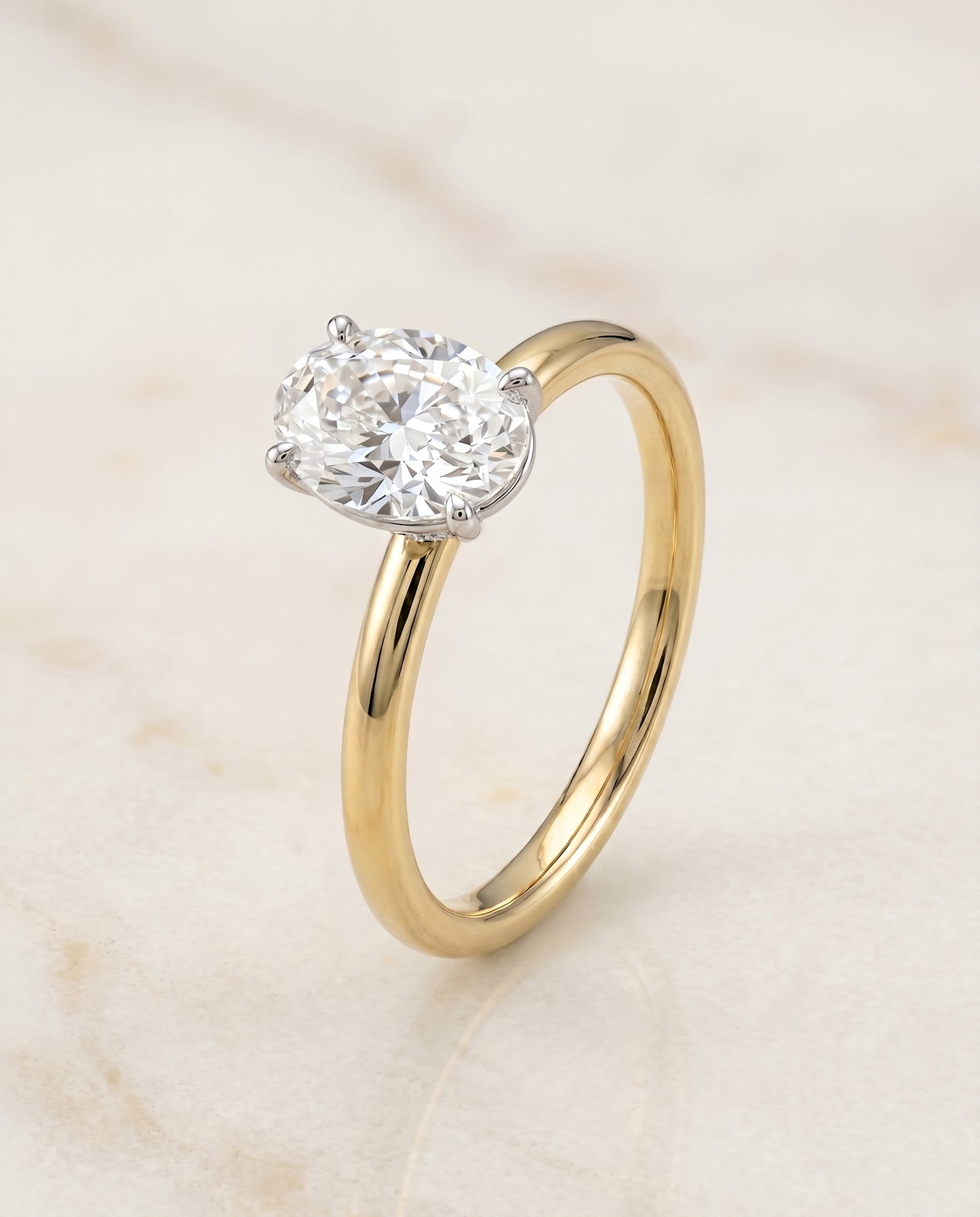 The Joni Hidden Halo Engagement Ring Setting for Oval Diamonds in 18K Yellow Gold