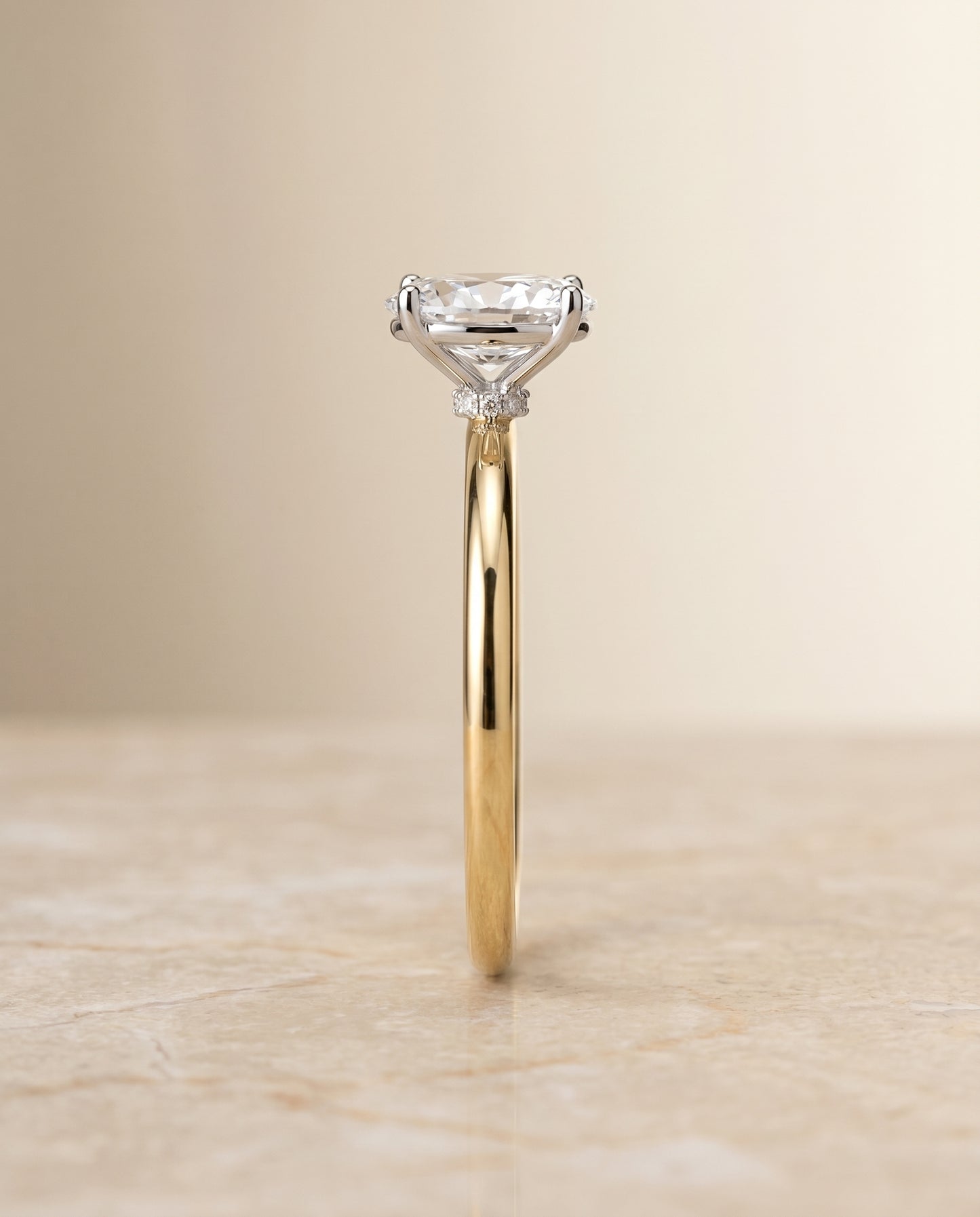 The Joni Hidden Halo Engagement Ring Setting for Oval Diamonds in 18K Yellow Gold