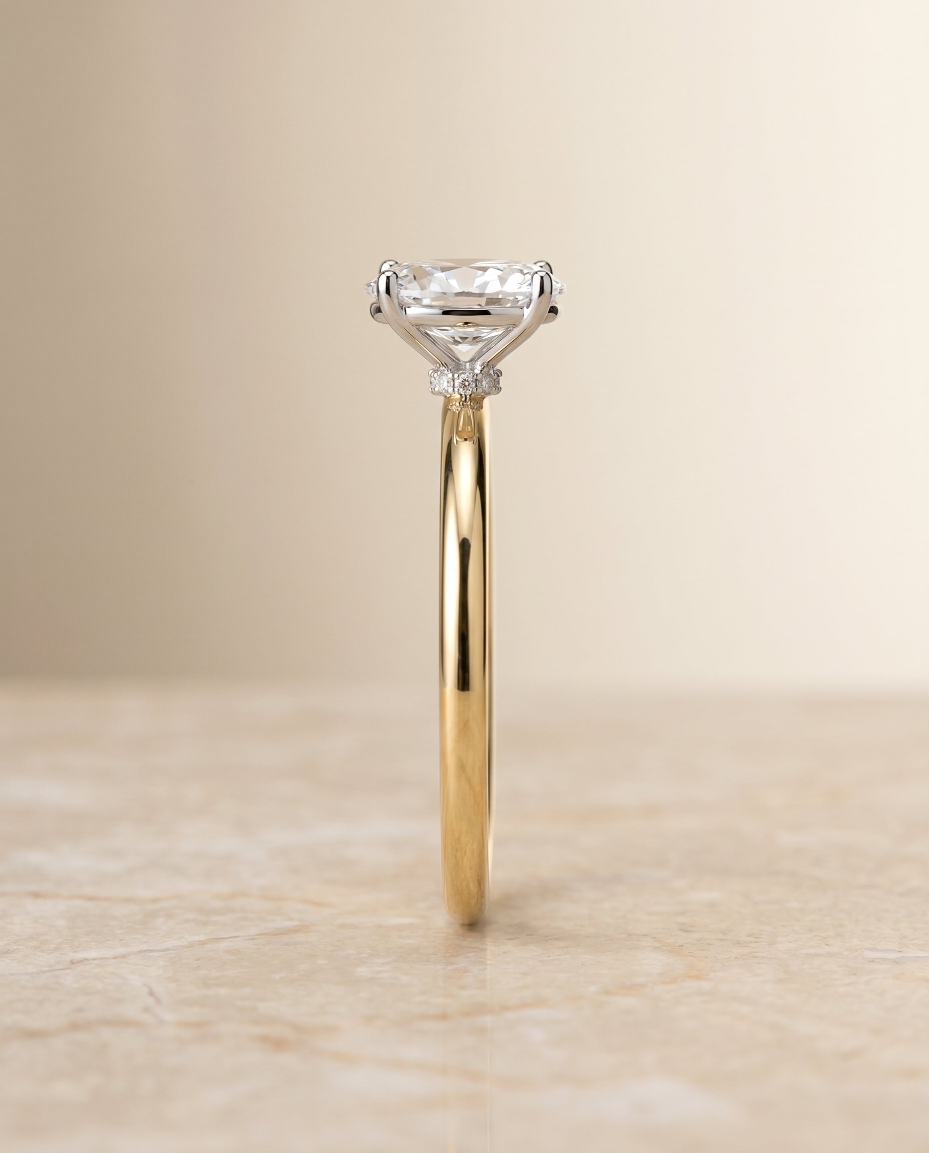 The Joni hidden halo solitaire engagement ring setting, shown in 18K Yellow Gold | RockHer