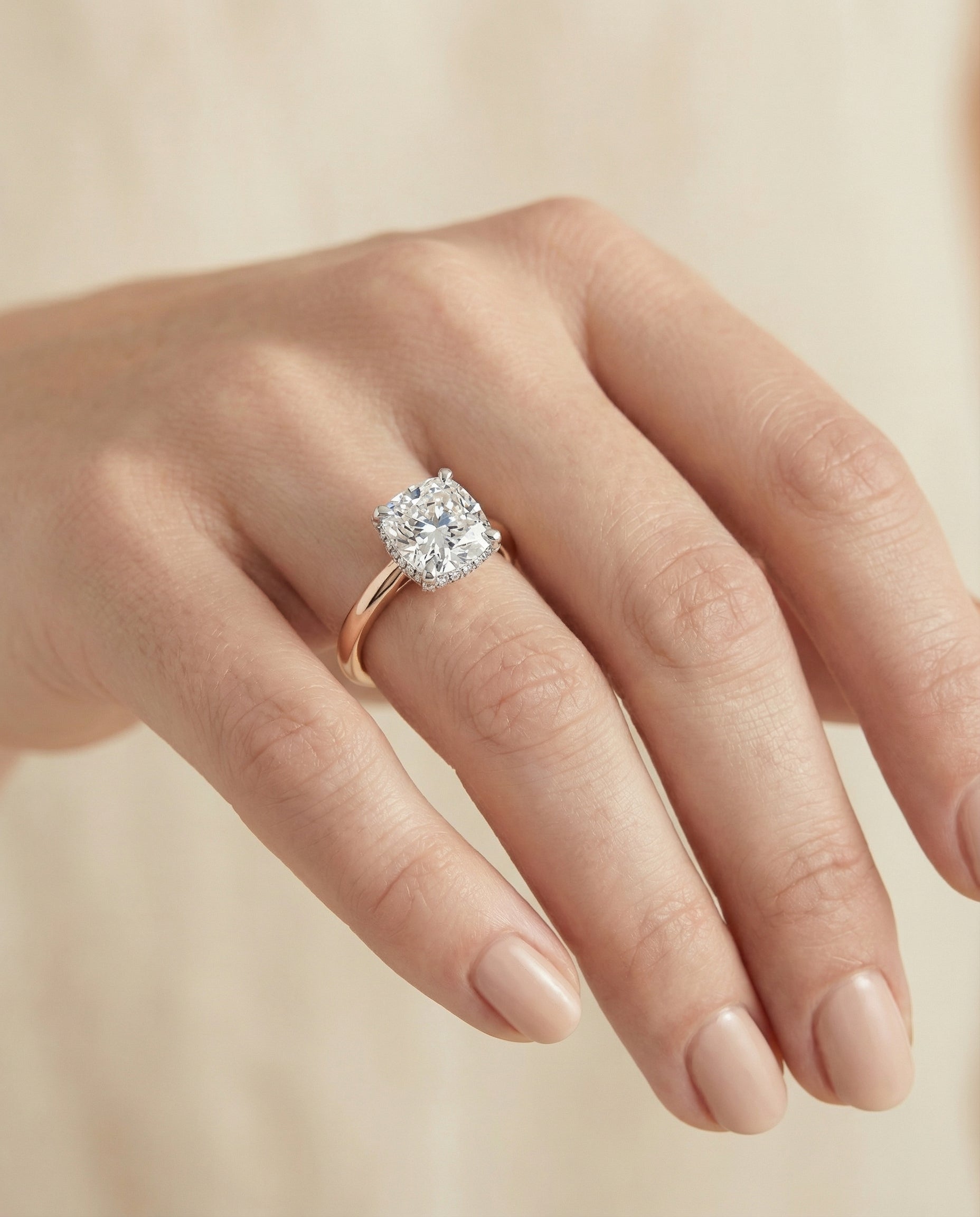The Annabelle engagement ring setting in 14K Rose Gold, hidden pavé basket crown solitaire cut design | RockHer