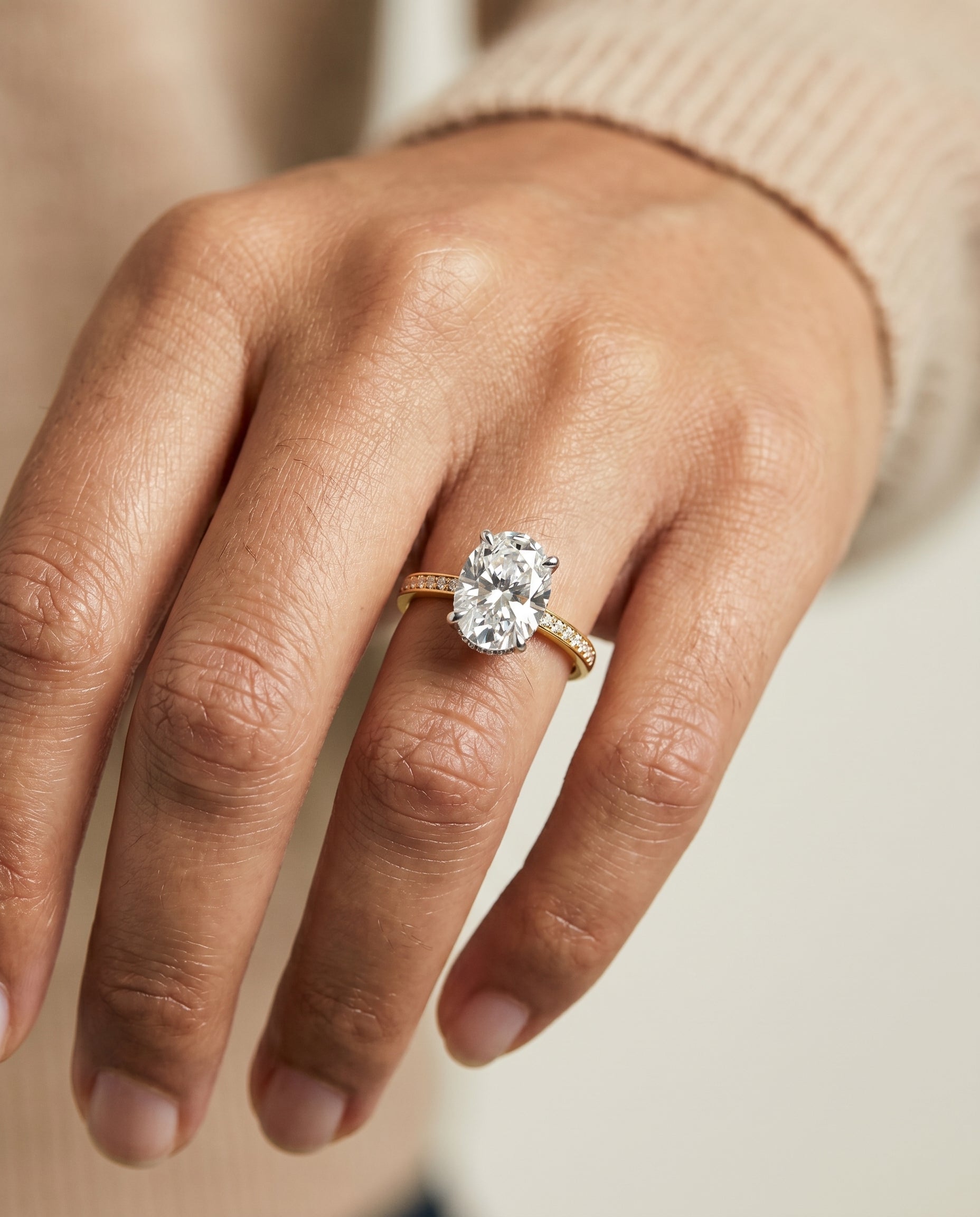 The Brenda engagement ring setting in precious metal, hidden halo engagement ring setting for oval diamonds in 18k yellow...
