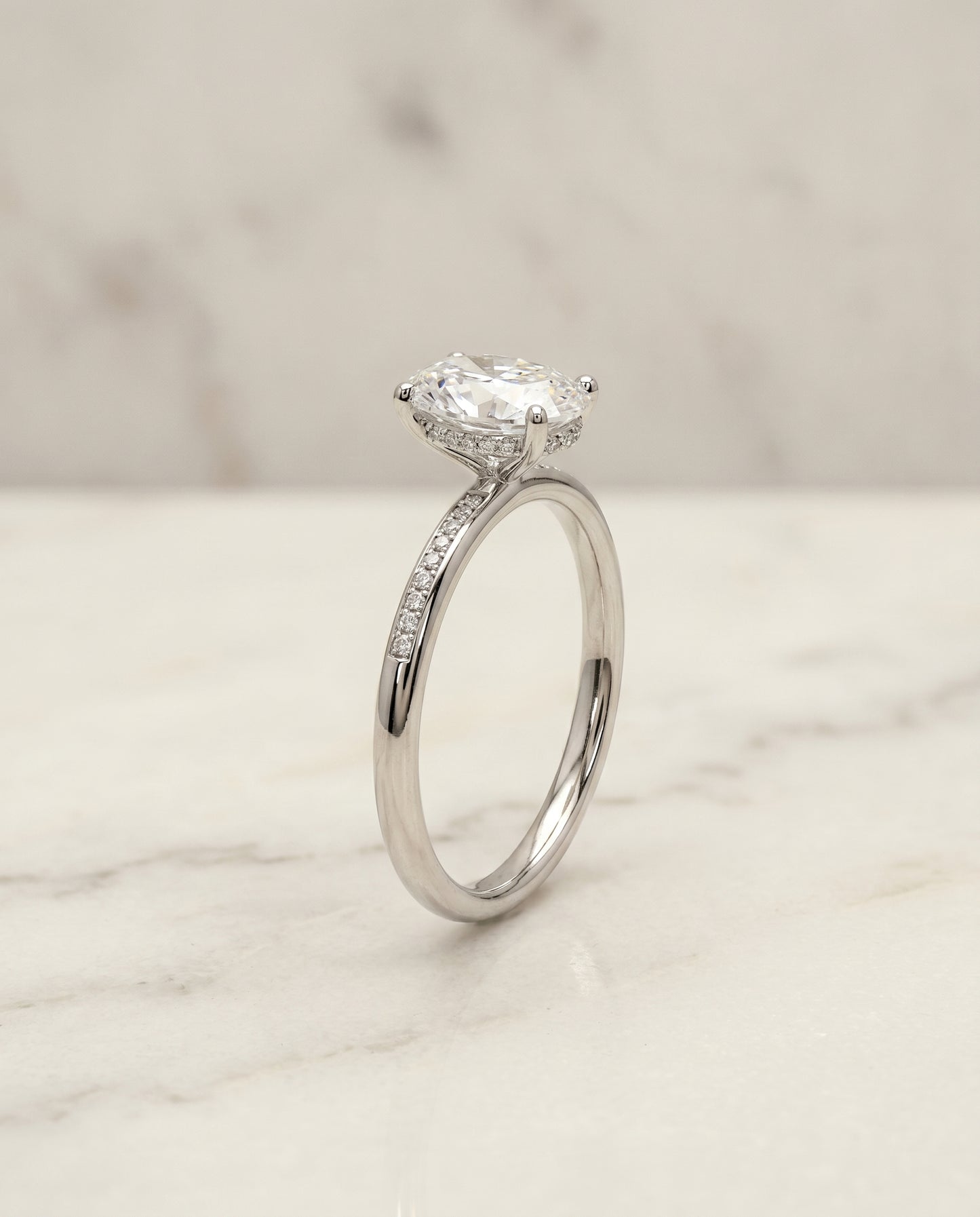 The Brenda Hidden Halo Solitaire Engagement Ring Setting for Oval Diamonds in 18K White Gold