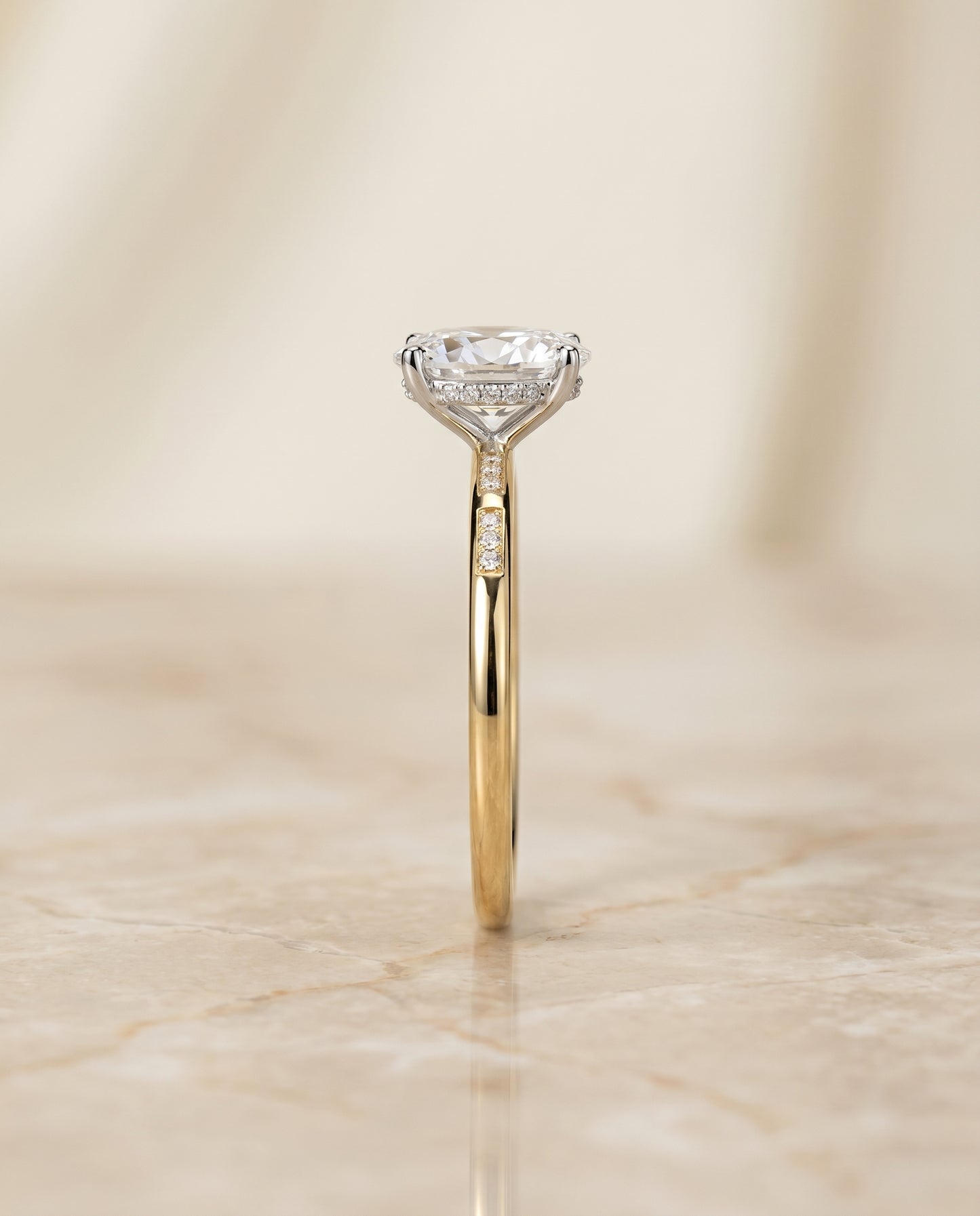 The Wanda Solitaire Engagement Ring Setting for Oval Diamonds in 18K Yellow Gold