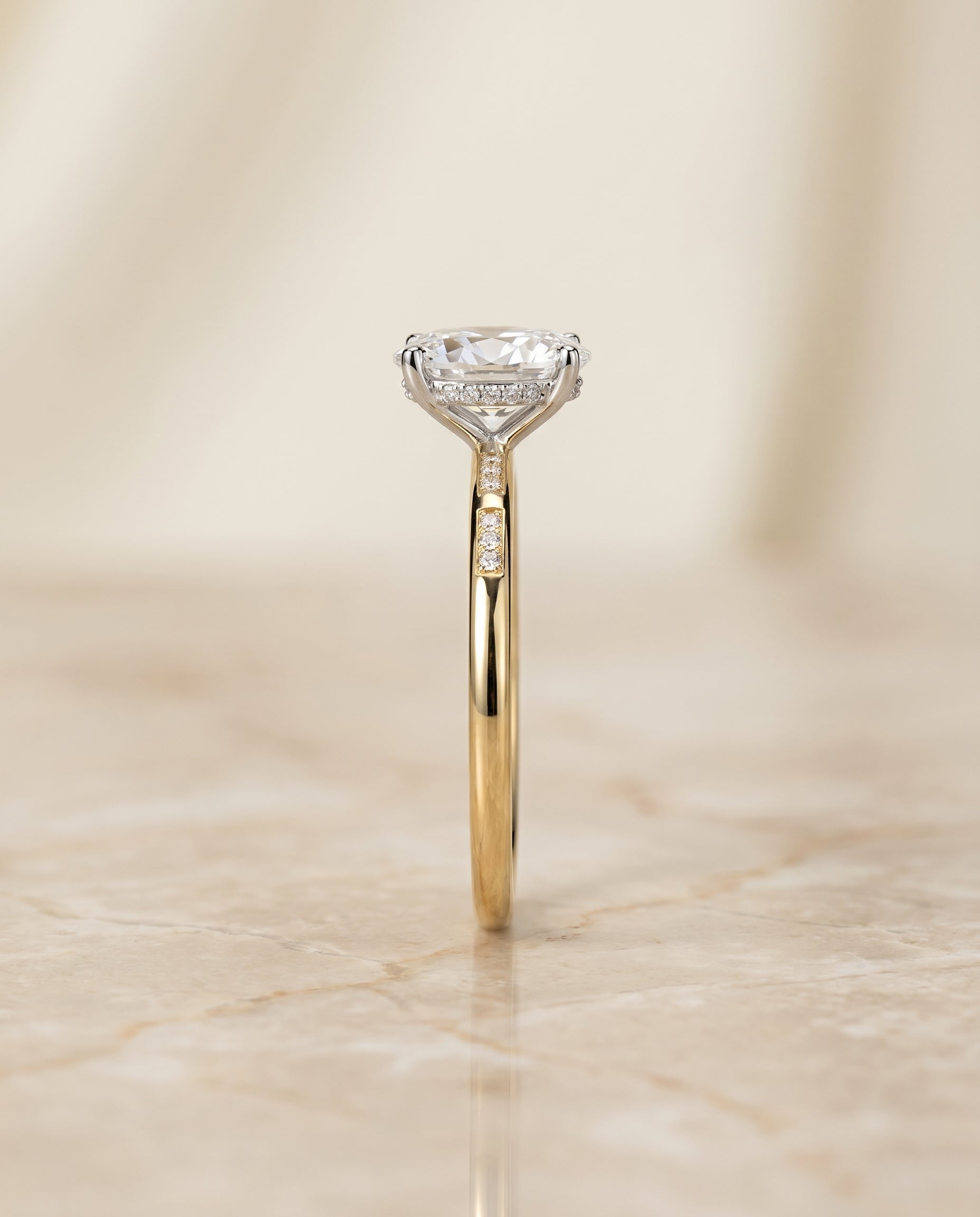 The Wanda hidden halo pavé solitaire engagement ring setting, shown in 18K Yellow Gold | RockHer