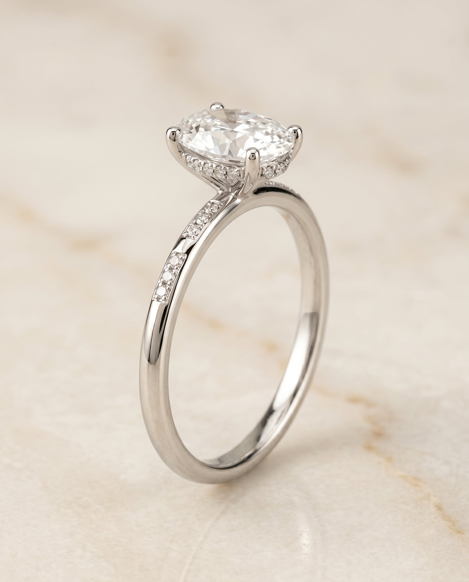 Hidden Halo Pavé Solitaire styling on The Wanda oval engagement ring setting | RockHer