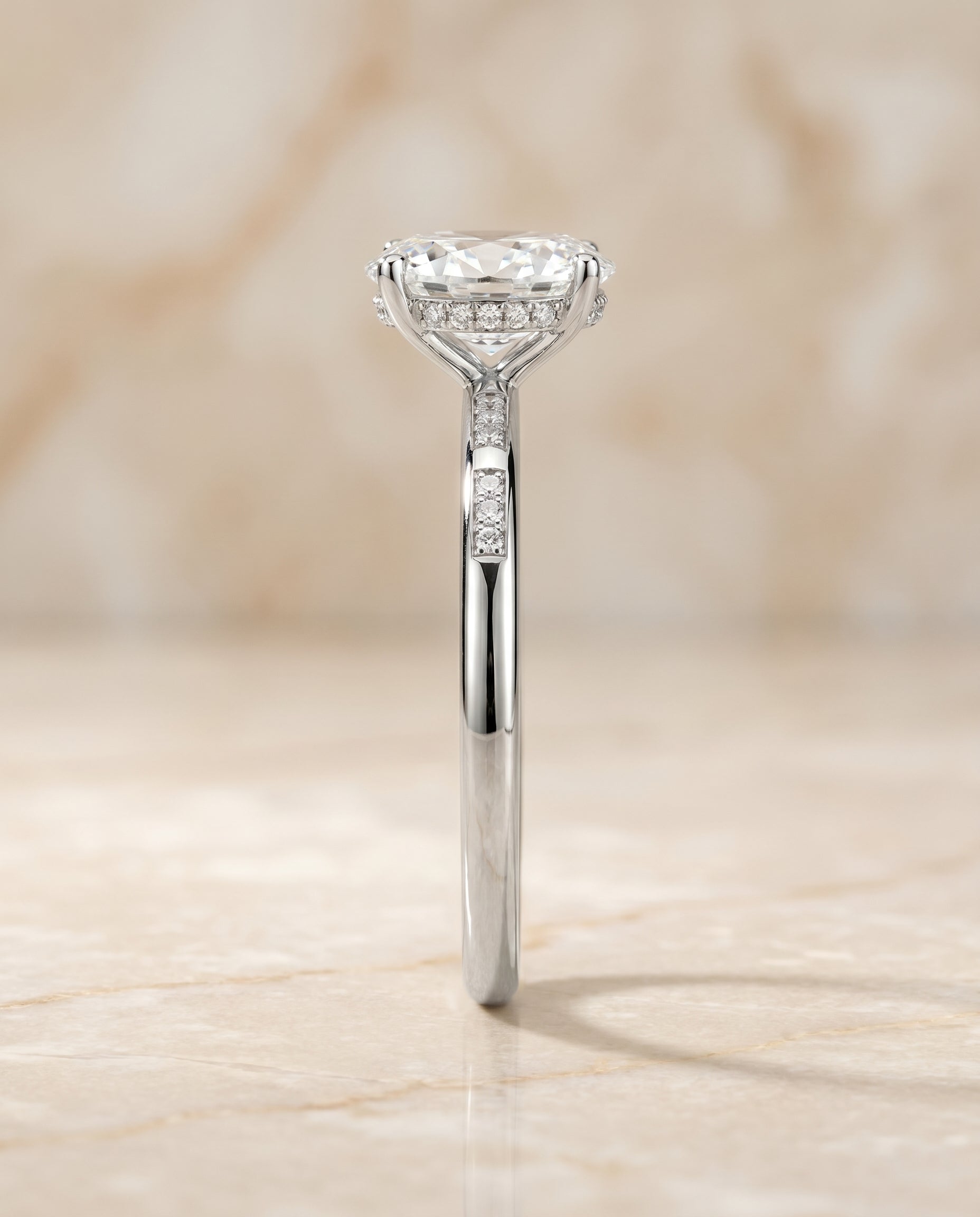 The Wanda hidden halo pavé solitaire engagement ring setting, shown in 18K White Gold | RockHer