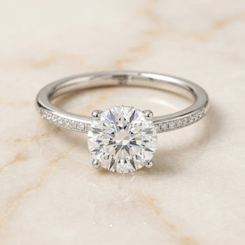 The Brenda High Hidden Halo Solitaire Round Engagement Ring Setting in Platinum