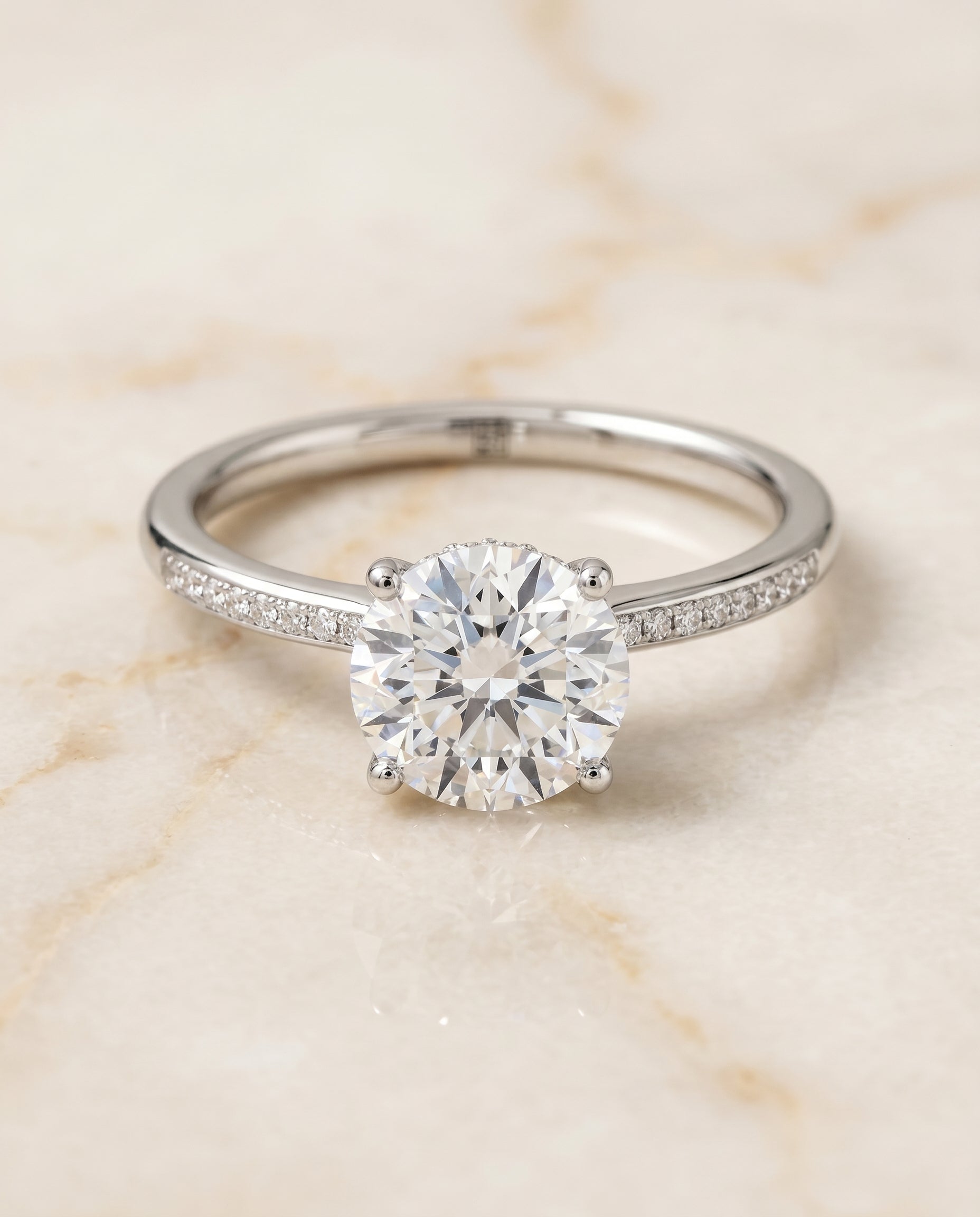 High Hidden Halo Solitaire styling on The Brenda round engagement ring setting | RockHer