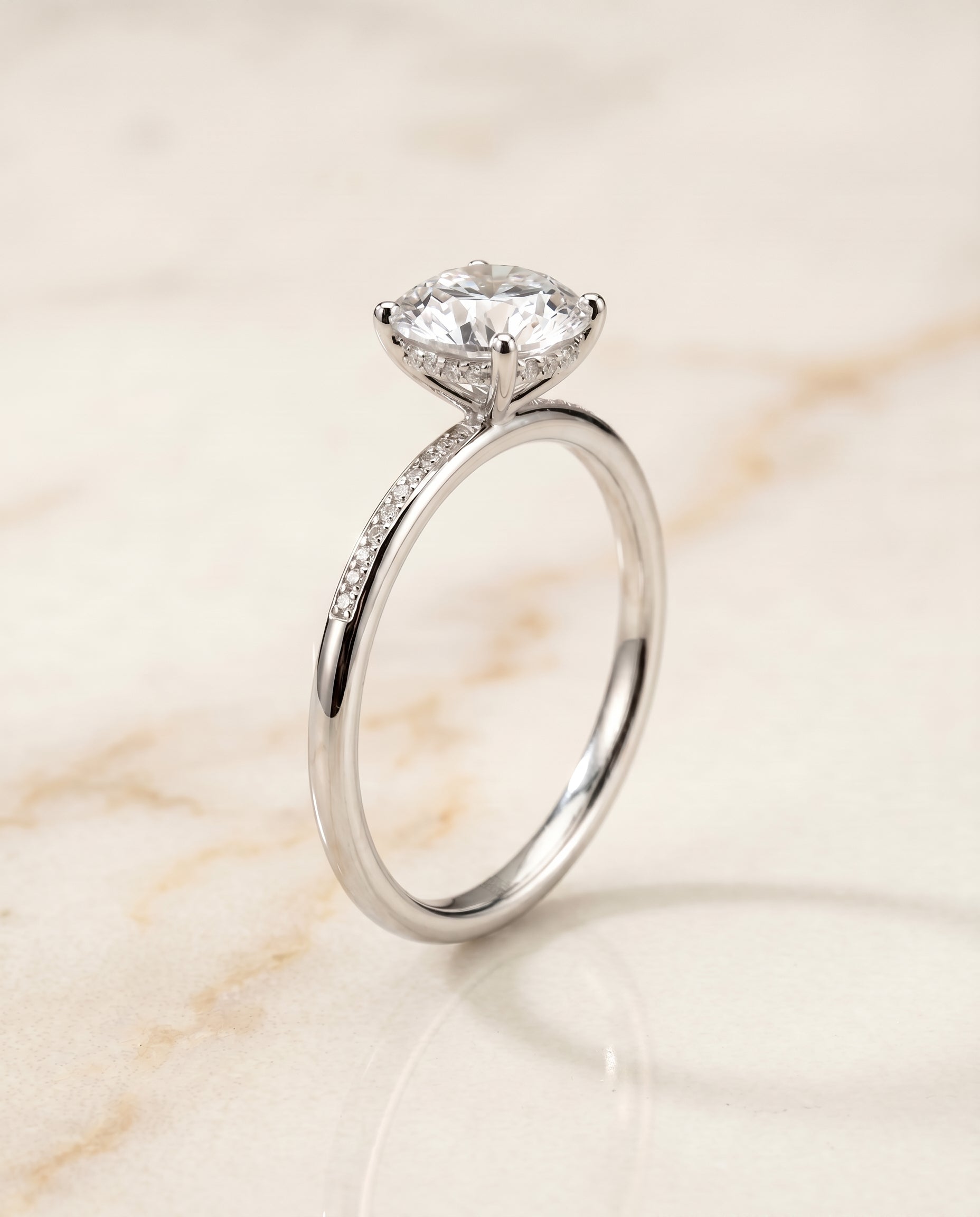 High Hidden Halo Solitaire styling on The Brenda round engagement ring setting | RockHer