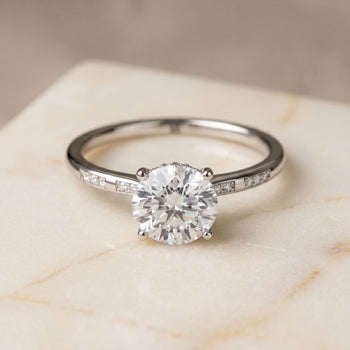 The Wanda Hidden Halo Pavé Solitaire Round Engagement Ring Setting in Platinum
