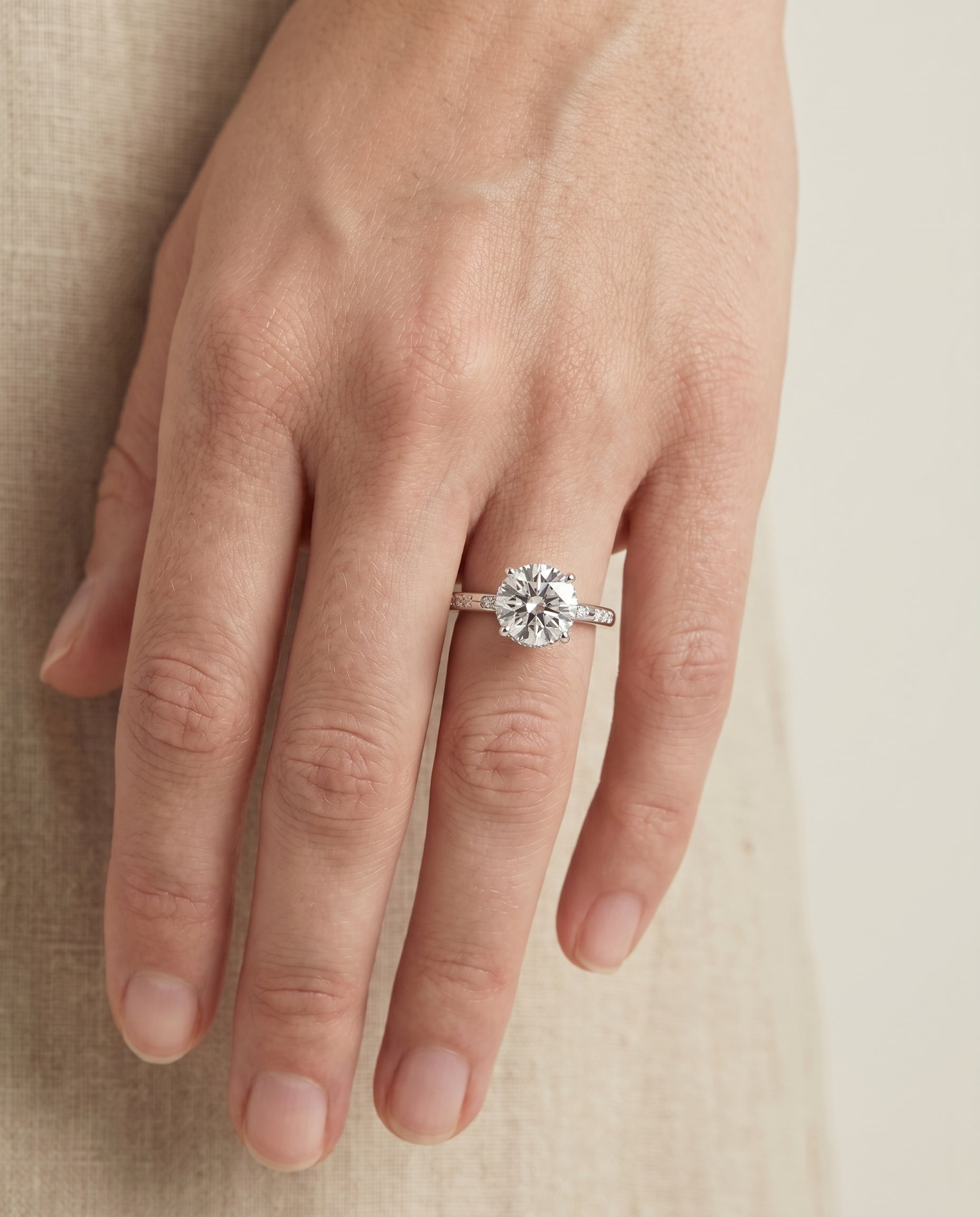The Wanda engagement ring setting in 18K White Gold, hidden halo pavé solitaire design | RockHer