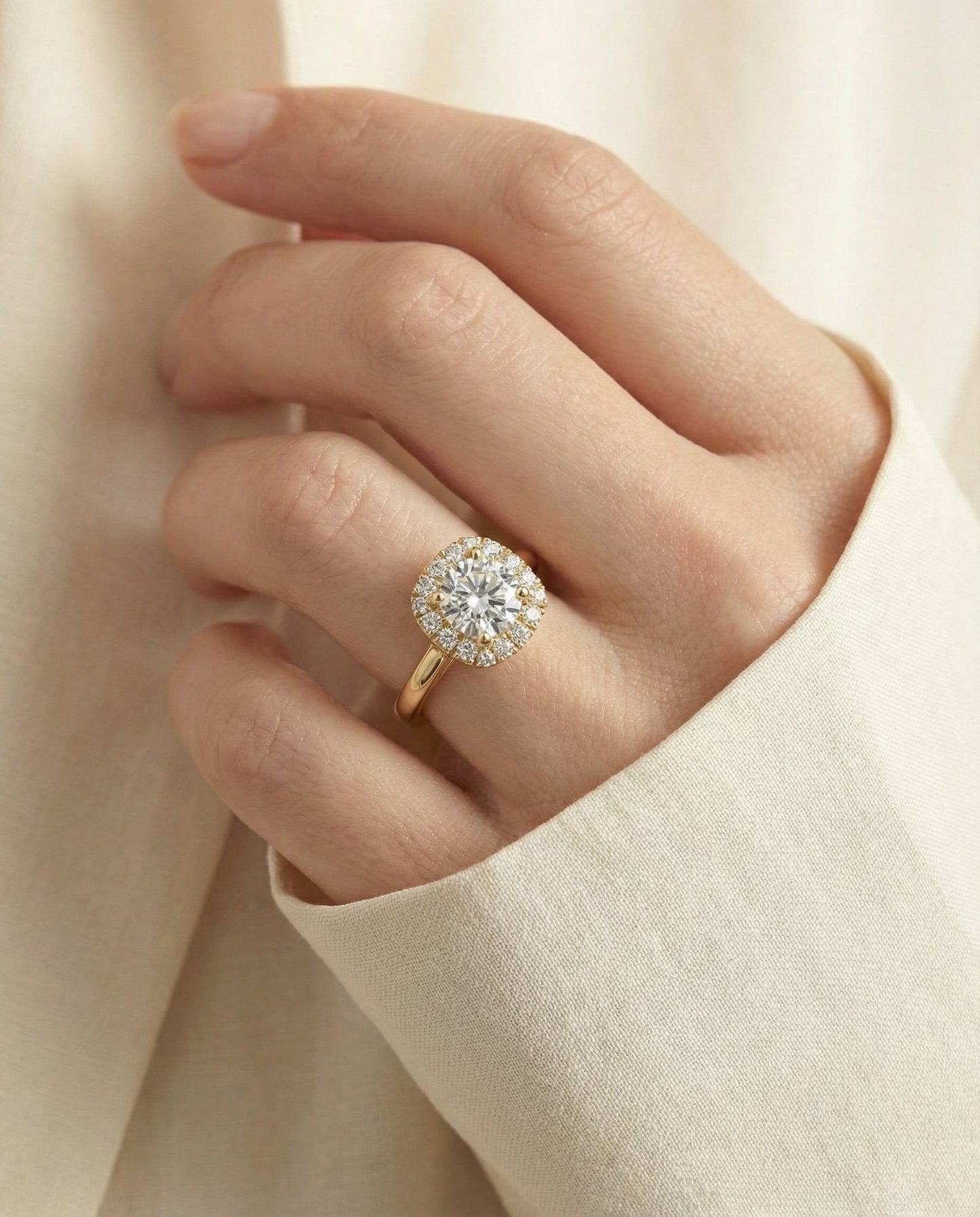 Amy Select high polish simple halo cushion cushion ring in 18K Yellow Gold — on hand angled — RockHer