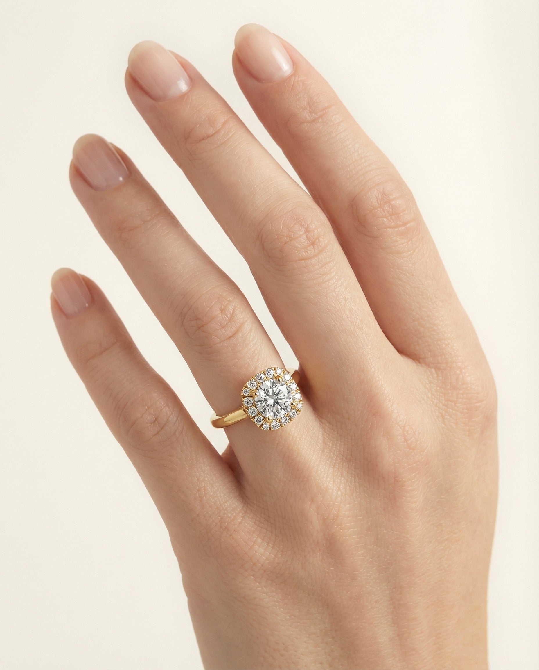 The Amy high polish simple halo cut engagement ring setting, shown in 18K Yellow Gold | RockHer