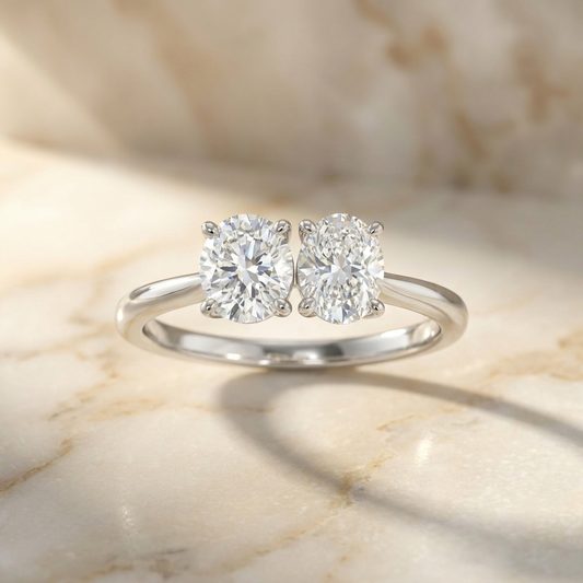 14K White Gold Jackie Select Toi et Moi Round & Oval Knife Edge Band Lab Diamond Engagement Ring - Hero on warm marble