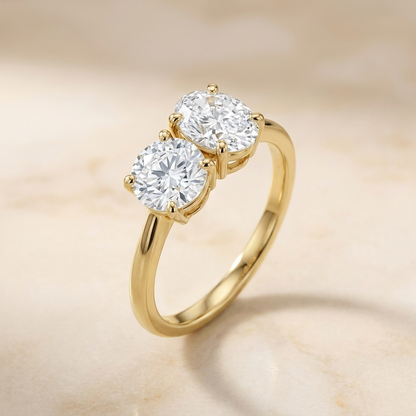 14K Yellow Gold Jackie Select Toi et Moi Round & Oval Knife Edge Band Lab Diamond Engagement Ring - Alt angle on warm marble