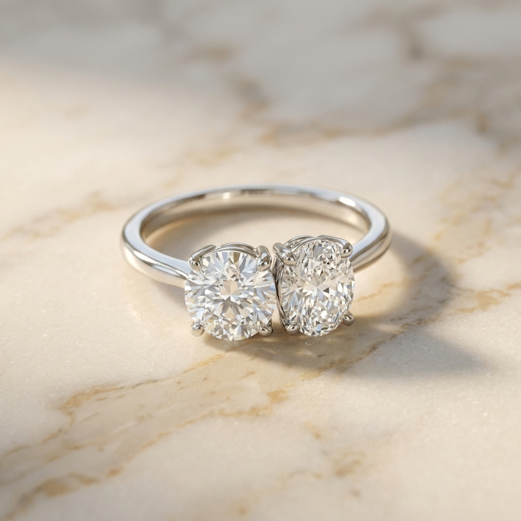 Platinum Jackie Select Toi et Moi Round & Oval Knife Edge Band Lab Diamond Engagement Ring - Hero on warm marble