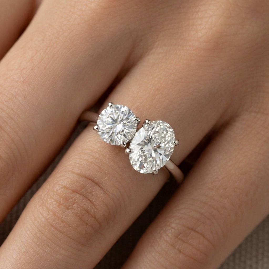 Platinum Jackie Select Toi et Moi Round & Oval Knife Edge Band Lab Diamond Engagement Ring - Macro close-up on finger