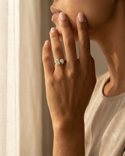 14K Yellow Gold Josephine Select Toi et Moi Emerald & Pear Bezel Set Lab Diamond Engagement Ring - Lifestyle scene with hand model
