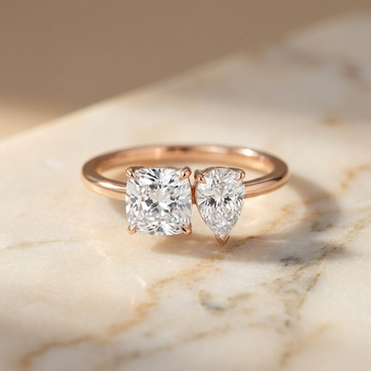 14K Rose Gold Lauryn Toi et Moi Select Cushion & Pear Lab Diamond Engagement Ring - Hero on warm marble