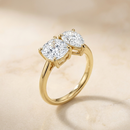 14K Yellow Gold Lauryn Toi et Moi Select Cushion & Pear Lab Diamond Engagement Ring - Alt angle on warm marble