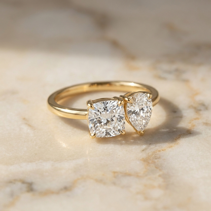 14K Yellow Gold Lauryn Toi et Moi Select Cushion & Pear Lab Diamond Engagement Ring - Hero on warm marble