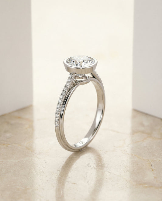 Cappella Select linear bezel pavé round ring in 14K White Gold — front — RockHer