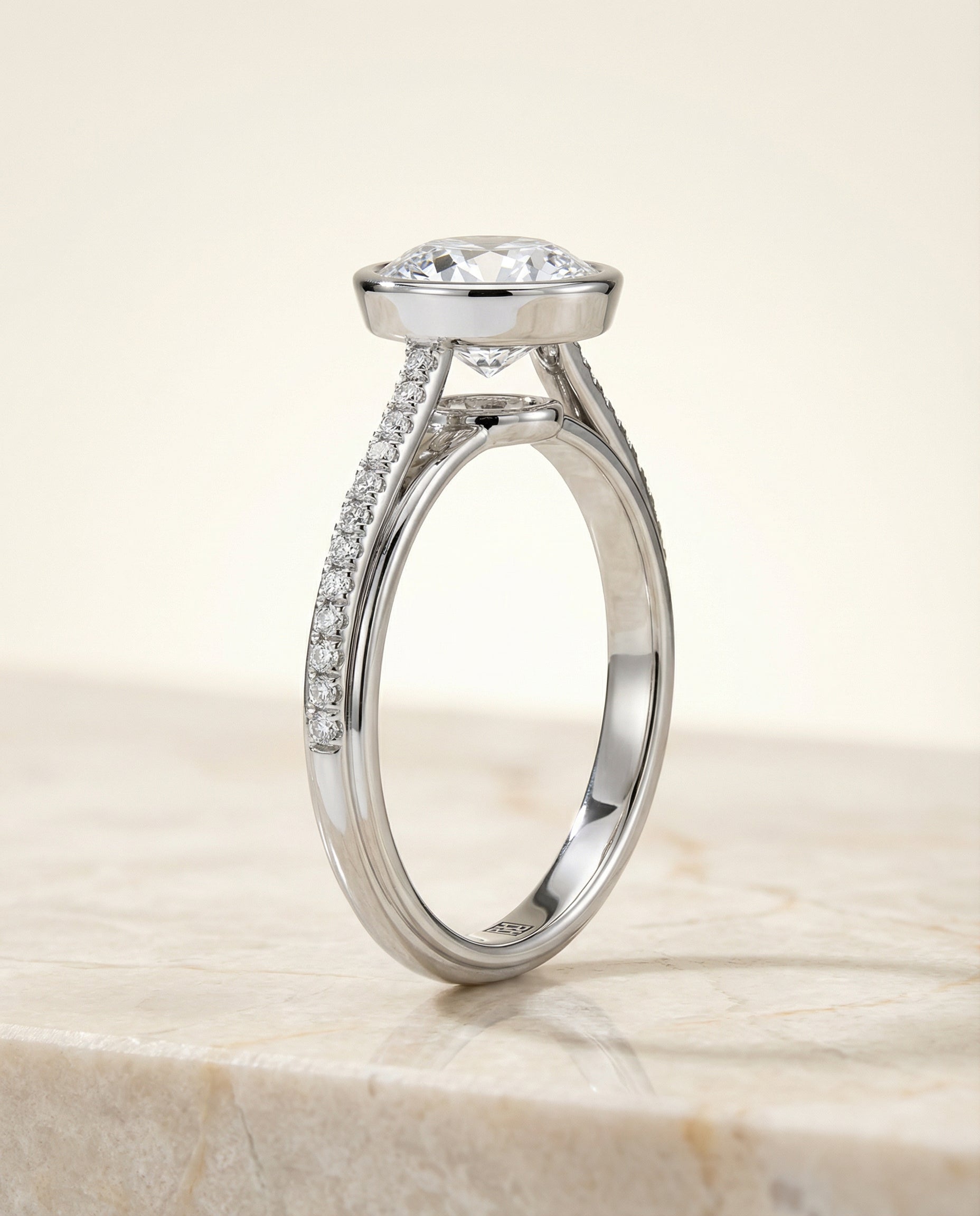 Cappella Select Bezel Solitaire Round Lab Diamond Engagement Ring in Platinum, side view | RockHer