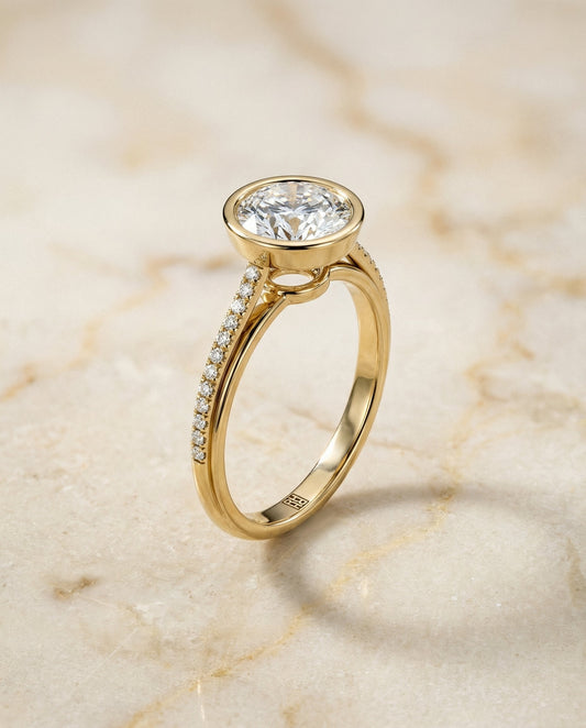 Cappella Select linear bezel pavé round ring in 14K Yellow Gold — front — RockHer