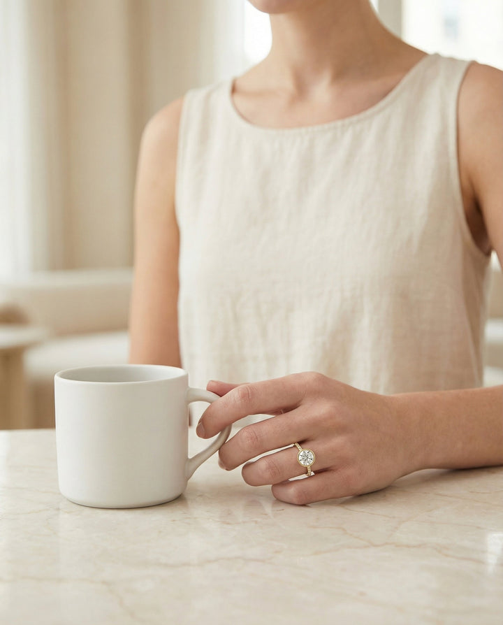 Cappella Select linear bezel pavé round ring in 14K Yellow Gold — lifestyle — RockHer