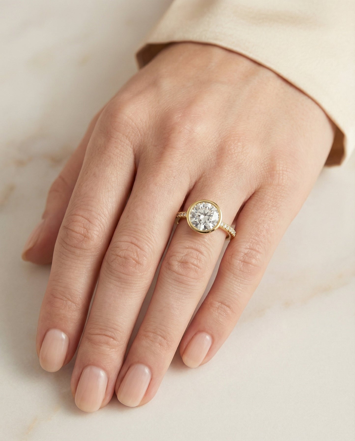 Cappella Select linear bezel pavé round ring in 14K Yellow Gold — front — RockHer