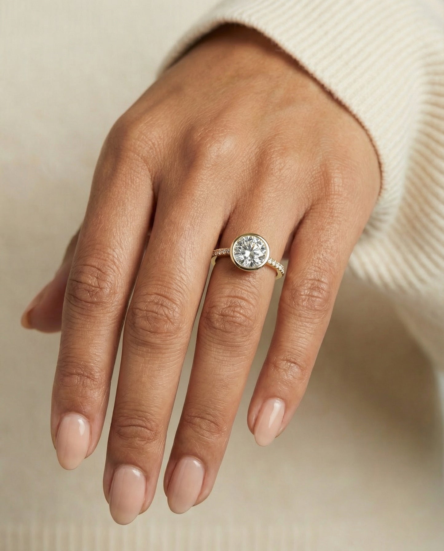 Round Brilliant, Linear Bezel Pavé, in 18K Yellow Gold – lifestyle shot | RockHer