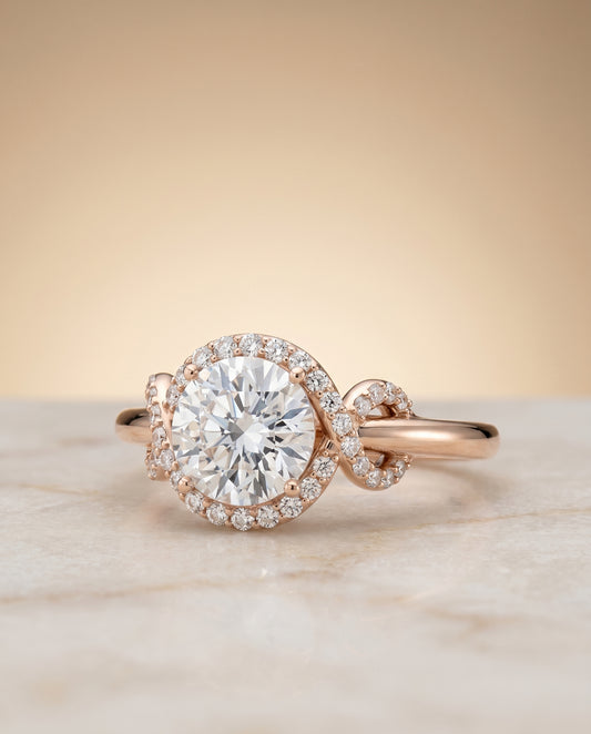 Round Brilliant, Love Knot Halo, in 14K Rose Gold, pave setting – angled view | RockHer