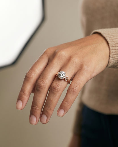 Round Brilliant, Love Knot Halo, in 14K Rose Gold, pave setting – lifestyle shot | RockHer