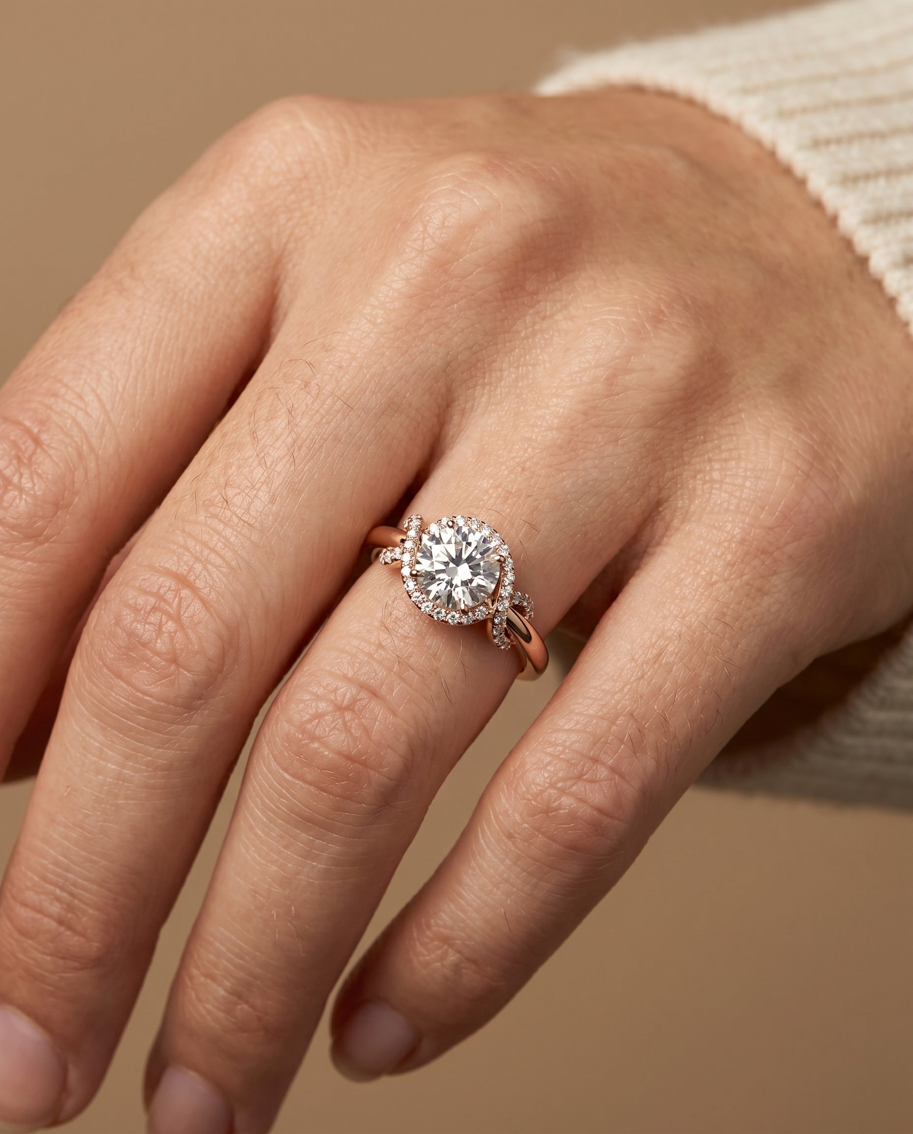 The Calista engagement ring setting in 14K Rose Gold, love knot halo design | RockHer