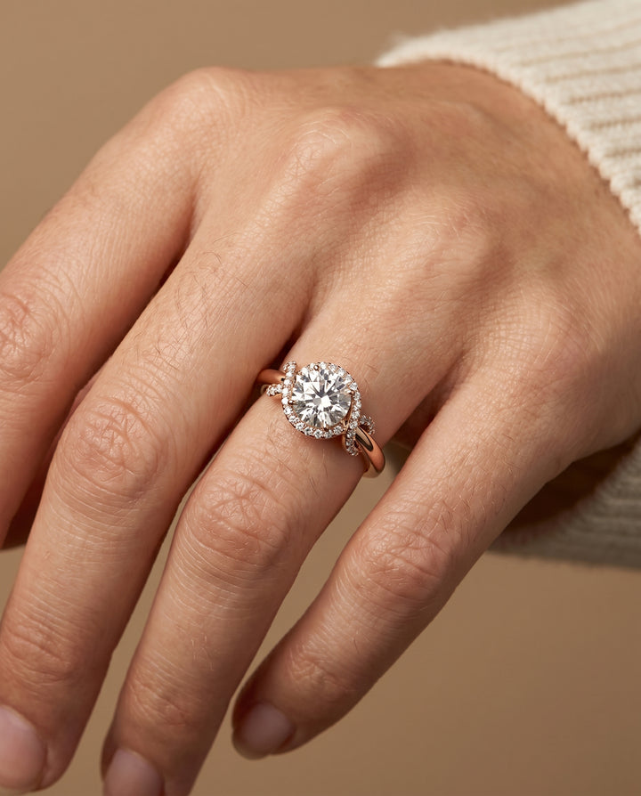 Round Brilliant, Love Knot Halo, in 14K Rose Gold, pave setting – lifestyle shot | RockHer