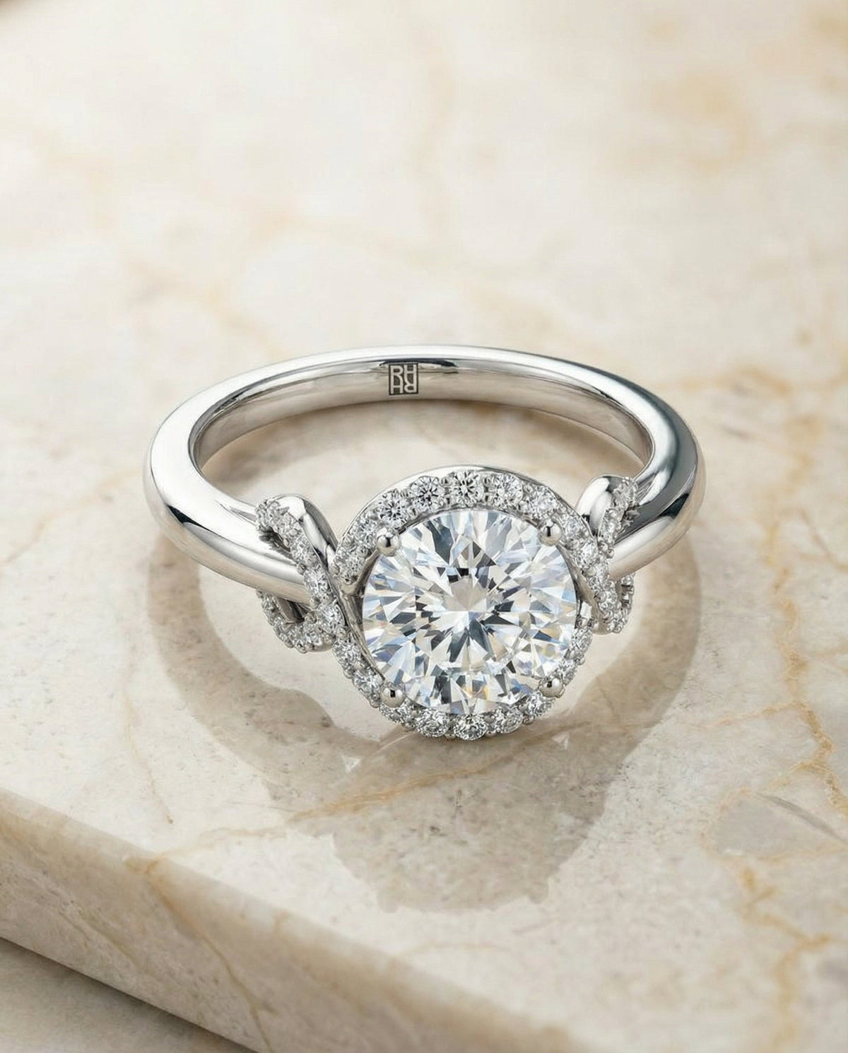 Calista Select Love Knot Halo Round Lab Diamond Engagement Ring in Platinum, alternate angle | RockHer