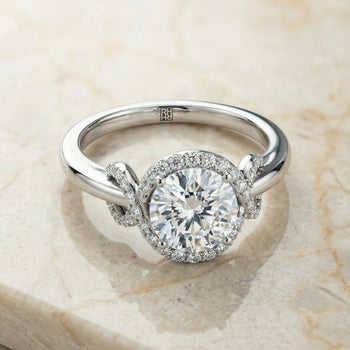 The Calista Love Knot Halo Round Engagement Ring Setting in 18K White Gold