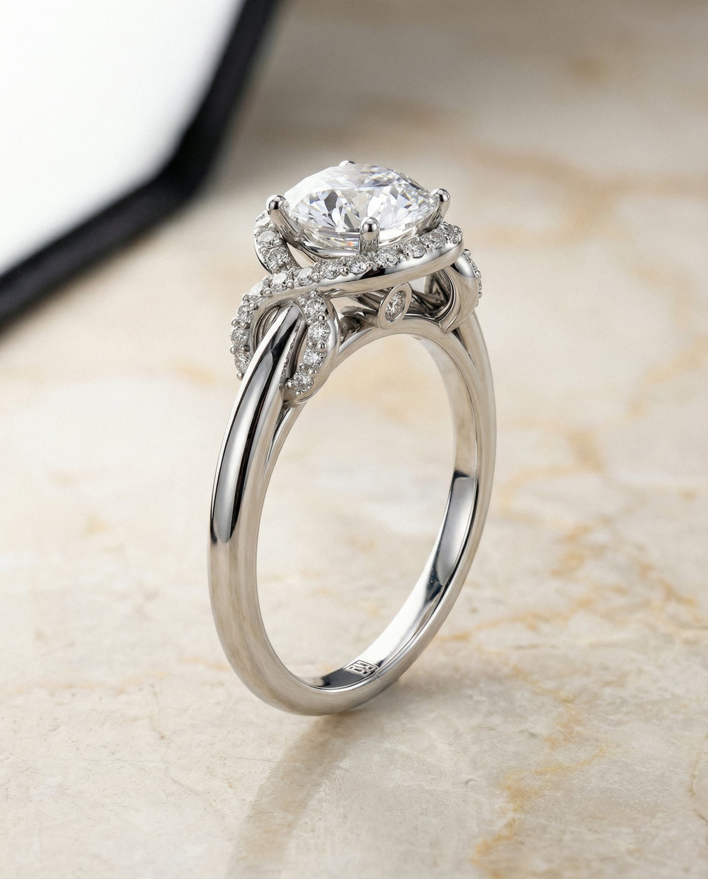 Round Brilliant, Love Knot Halo, in Platinum, pave setting – front view | RockHer