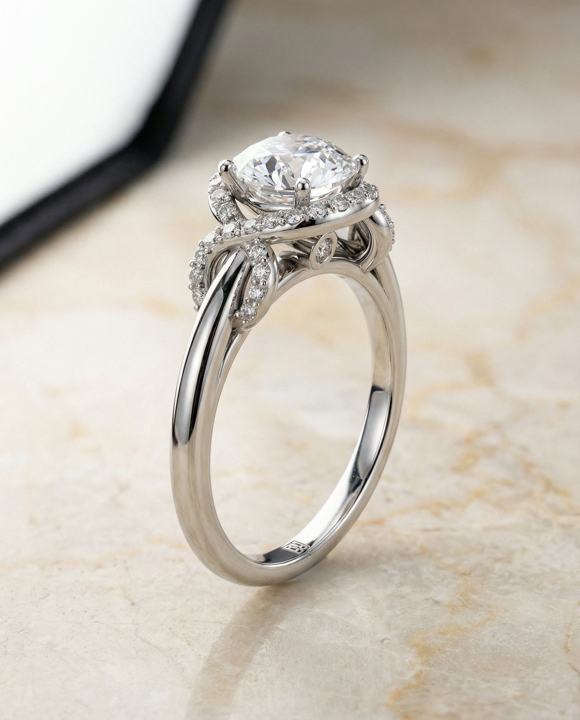 Love Knot Halo styling on The Calista round engagement ring setting | RockHer