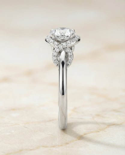 Round Brilliant, Love Knot Halo, in Platinum, pave setting – side profile | RockHer