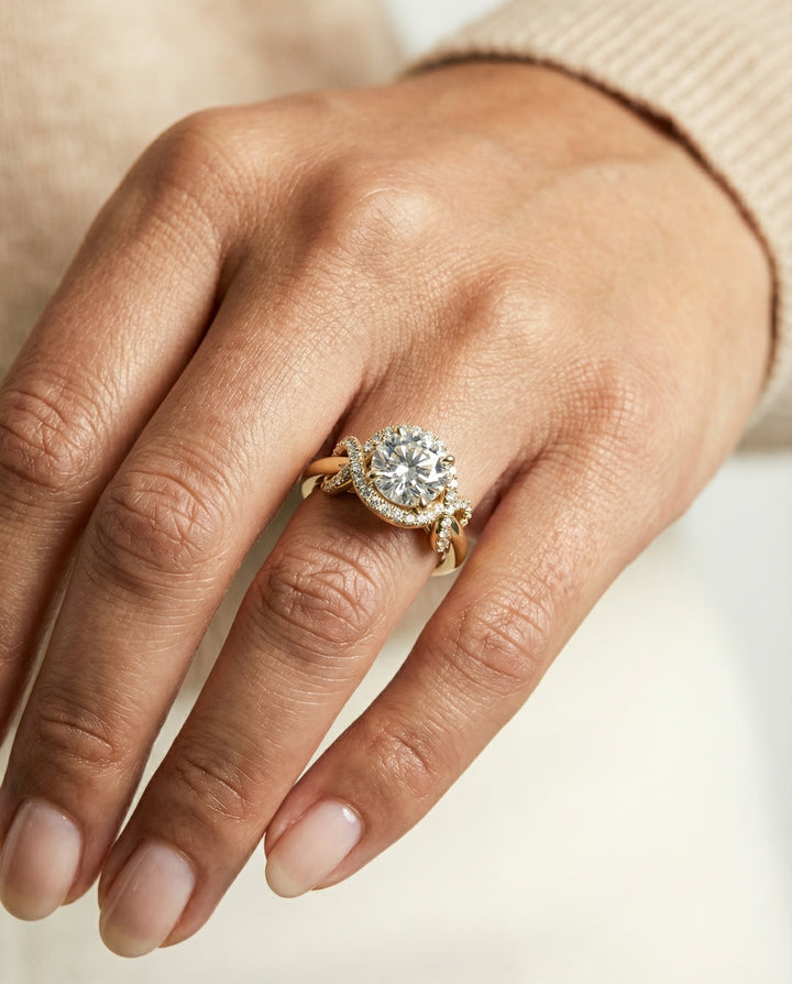 Round Brilliant, Love Knot Halo, in 18K Yellow Gold, pave setting – lifestyle shot | RockHer