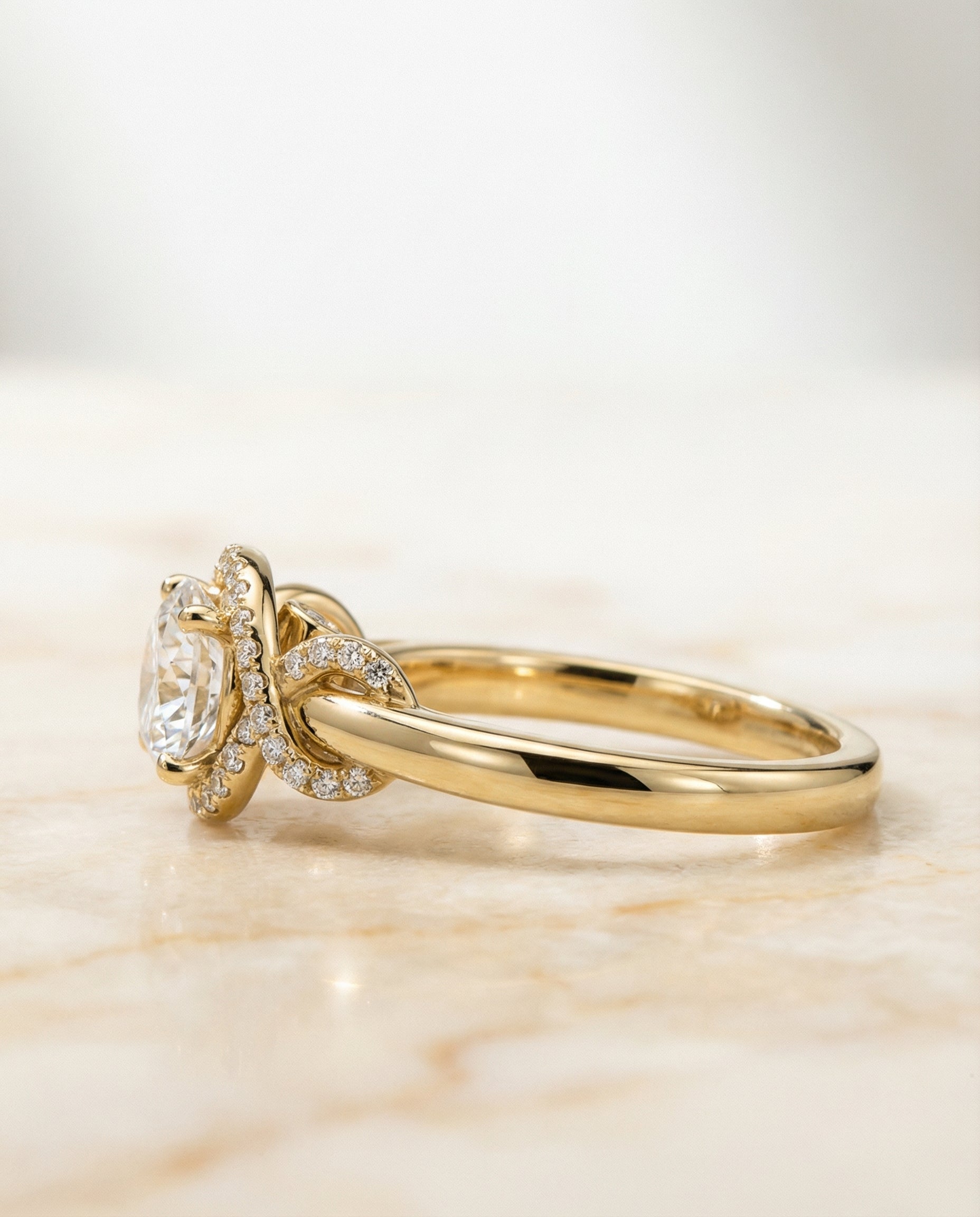 Select Love Knot Halo styling on The Calista round engagement ring setting | RockHer